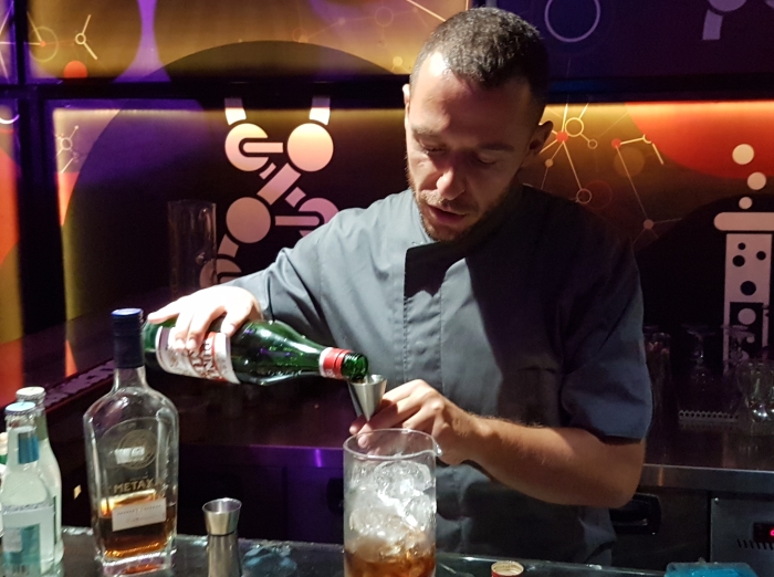 Bartender making a cocktail in Athens, Greece